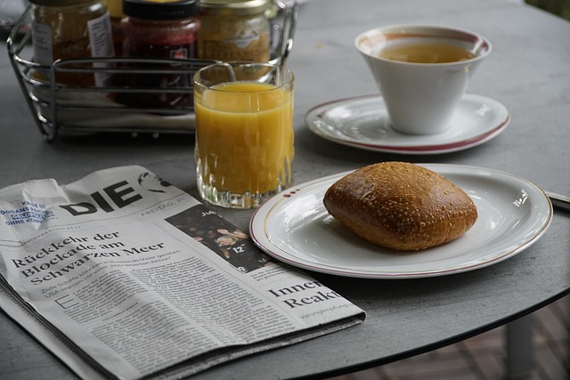 modern bicycle and coffee cup on wooden table European cafe cycling culture